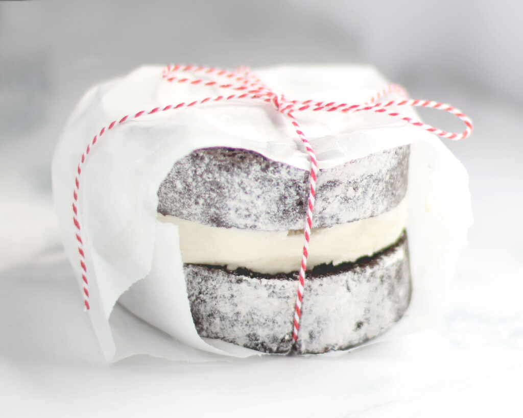 Kid-Approved Treats - Ice cream sandwich wrapped in paper bag and tied together with red string
