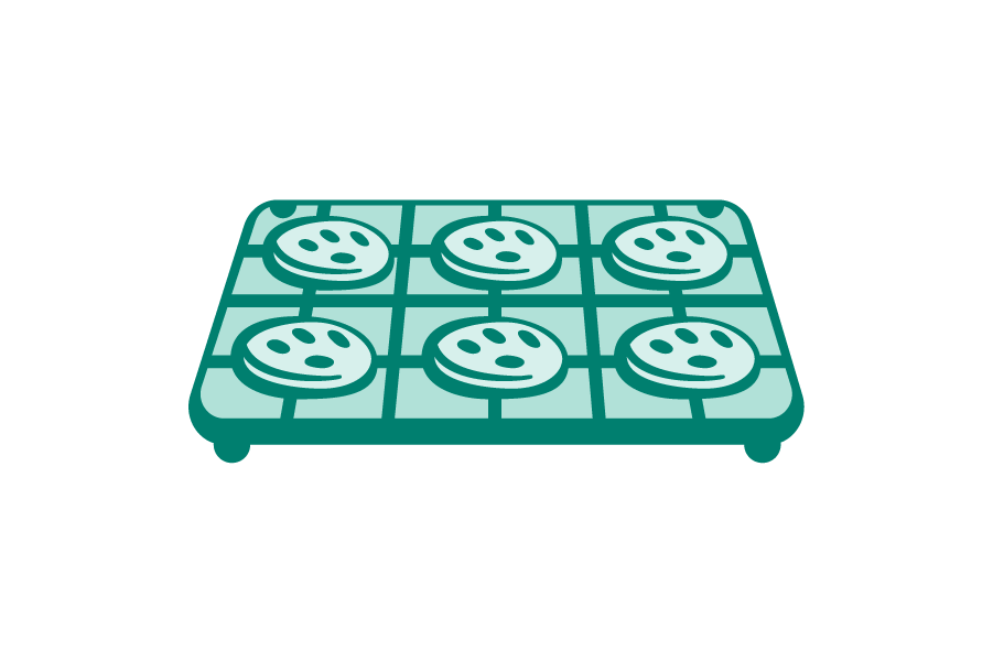 Teal cookies cooling on rack icons