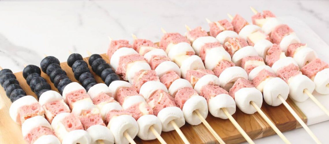 Star-Spangled Skewers - skewers with cake roll pieces, marshmallows, and blueberries that look like the American flag