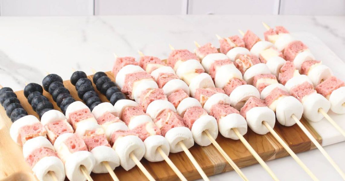 Star-Spangled Skewers - skewers with cake roll pieces, marshmallows, and blueberries that look like the American flag